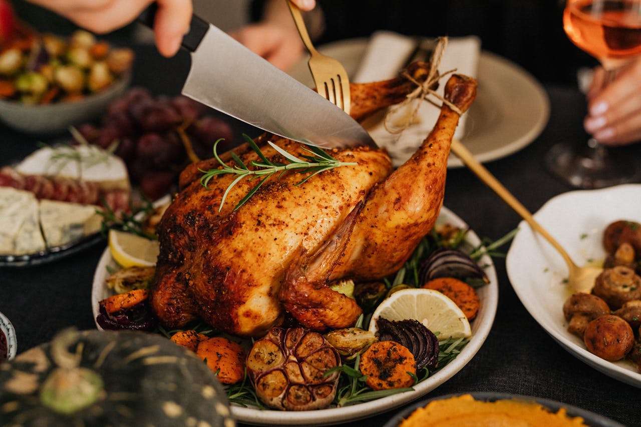 A delicious roasted chicken with vegetables, perfect for a holiday feast.